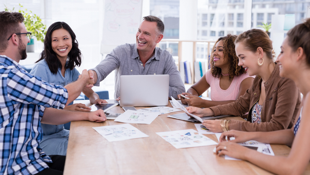 executives-shaking-hands-in-the-meeting-2023-11-27-04-58-12-utc